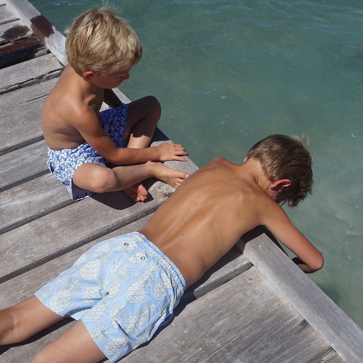 Boys swim trunks : PINEAPPLE - OLIVE on the dock Mustique