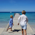 Childrens Linen Shirt: WHITE running down the jetty Mustique