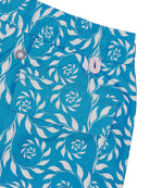 Back pocket detail of children's premium sustainable quick dry swim shorts in turquoise fern print