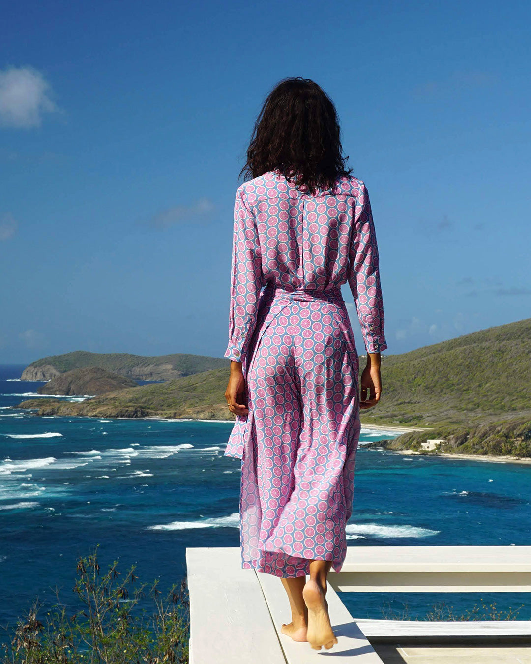 Womens island vacation style pure silk Kim blouse in Lime Slice blue and pink print worn with matching palazzo pants by designer Lotty B for Pink House