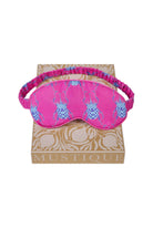 Limited edition pure silk eye mask in bright pink and blue Beetle print by Lotty B Mustique. Handmade in England