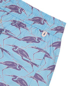 Pocket detail of sustainable Mens swim shorts in blue Egret bird print by Lotty B Mustique