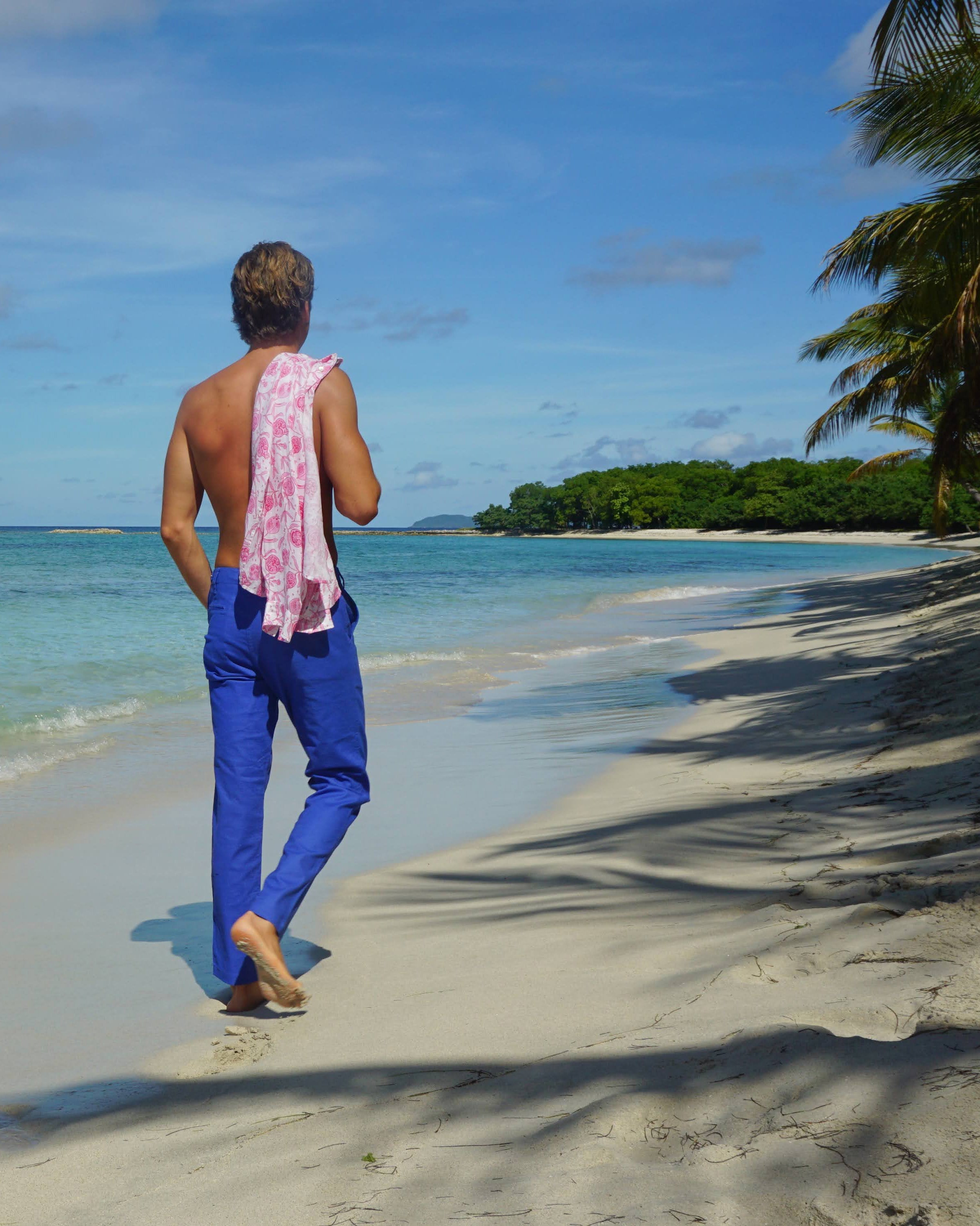 Mustique vacation style mens linen shirt in Pomegranate pink print by designer Lotty B