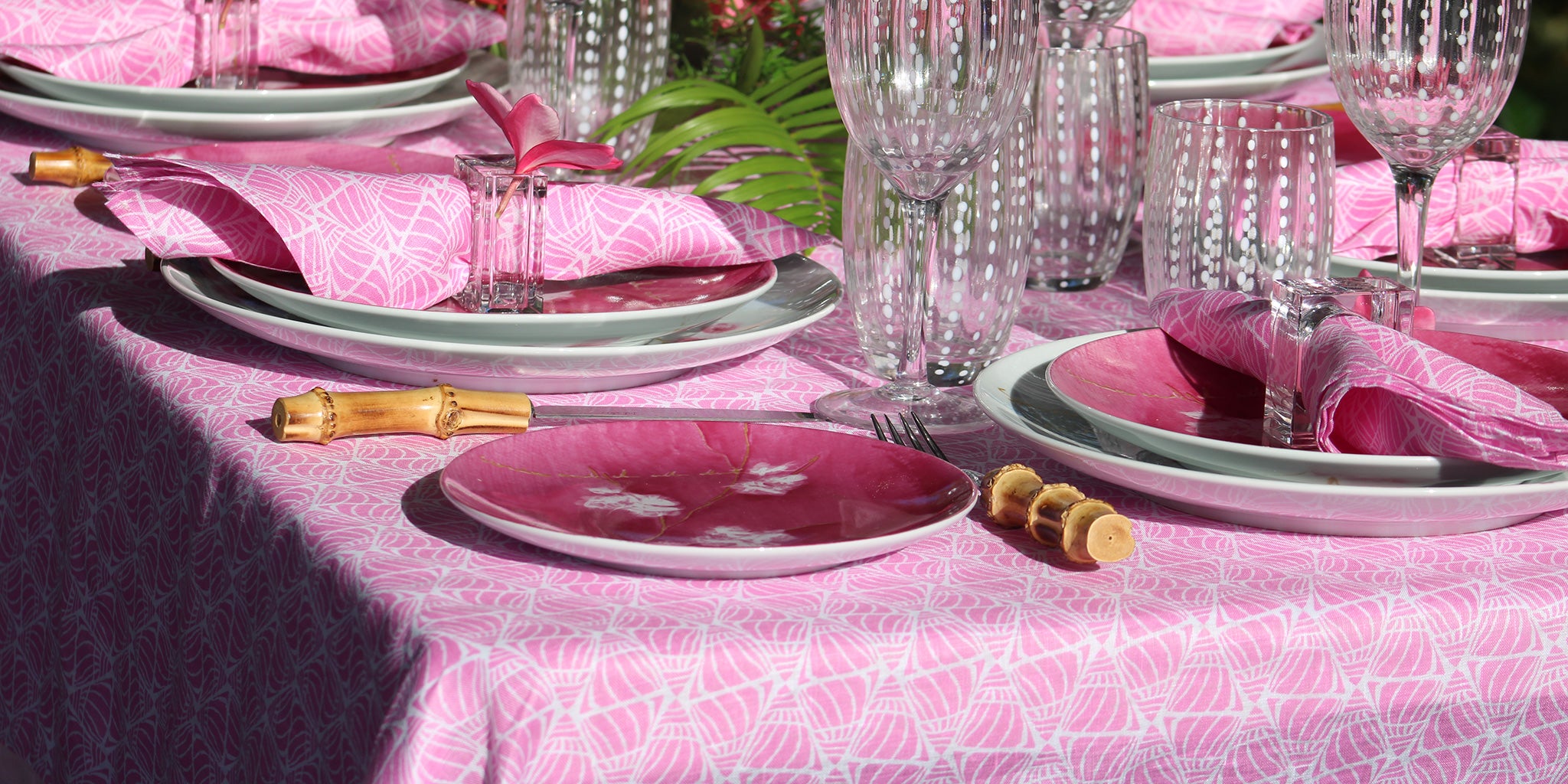 Bring some Caribbean color to your tablescape with screen printed linen table cloths that come with 8 matching napkins.