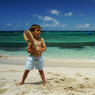 Boys swim trunks : BANANA TREE - PALE BLUE Mustique beach kids games, designer Lotty B for Pink House Mustique