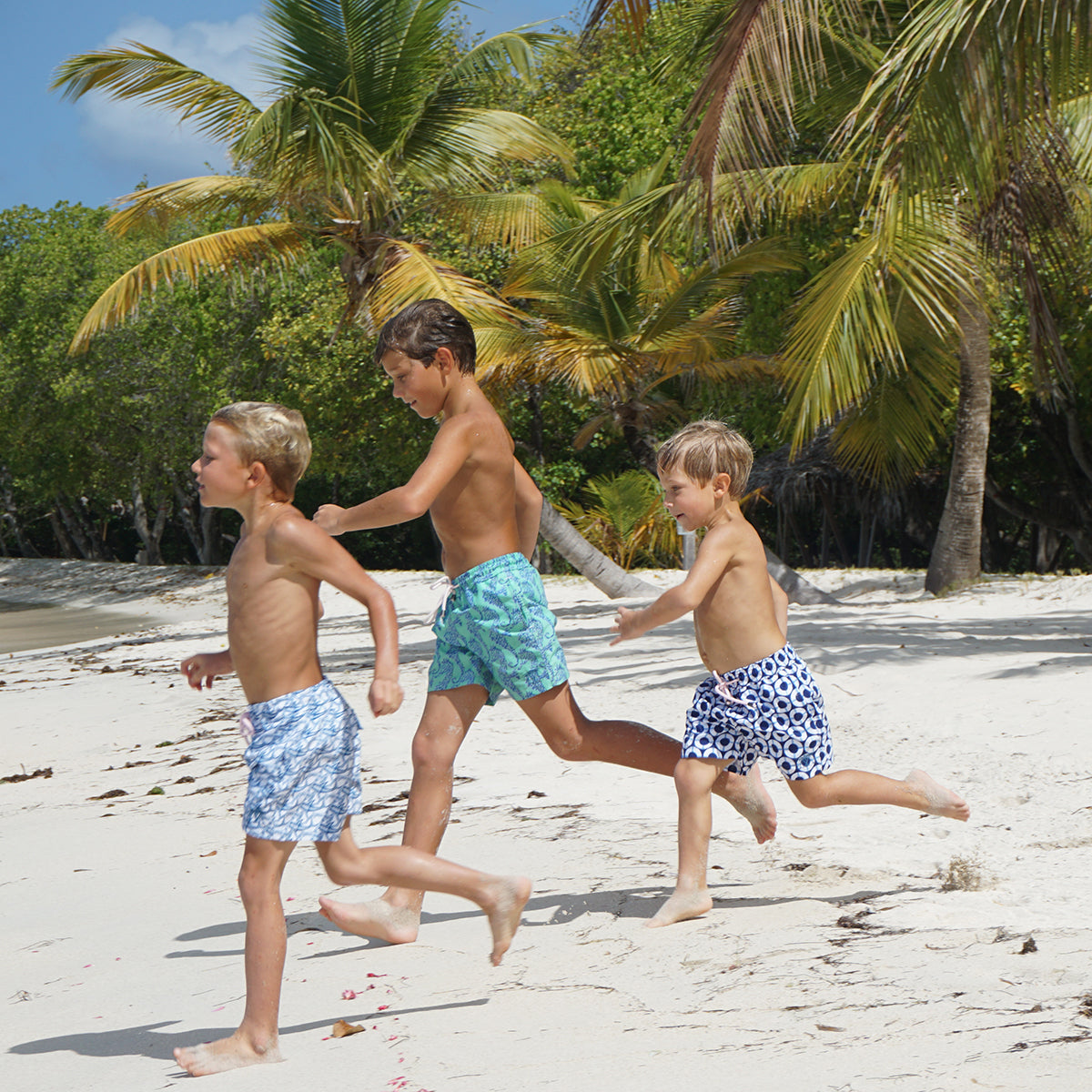 Navy blue Boys swim shorts in Life Ring print by designer Lotty B, Caribbean family holiday style