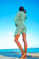 Chic poncho cover up in floral green Protea print by Lotty B Mustique