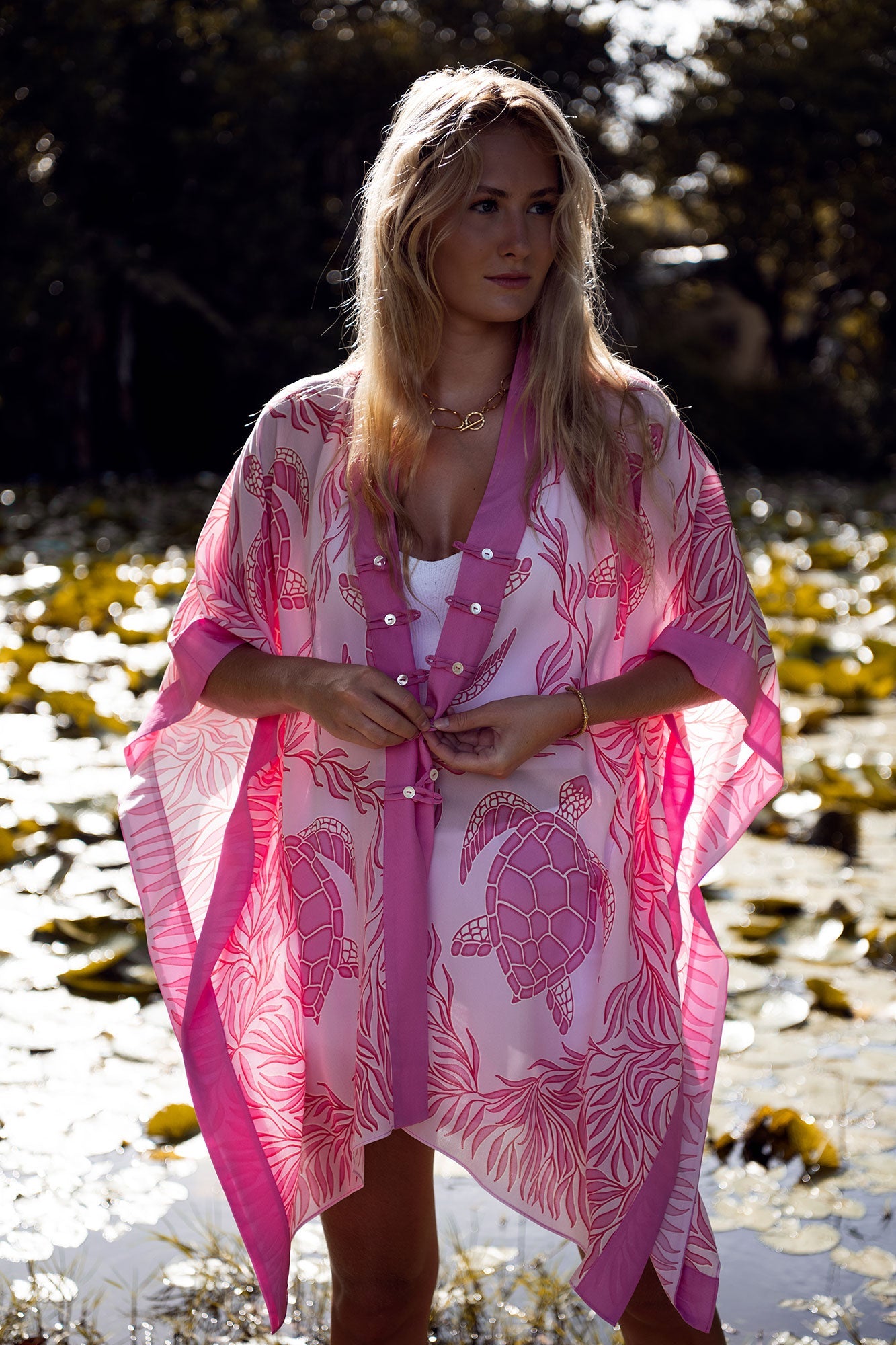 Tropical vacation style, pure silk poncho beach cover-up in Turtle pink print by designer Lotty B