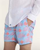 Designer mens swim shorts in Potted Palm coral turquoise by Pink House Mustique