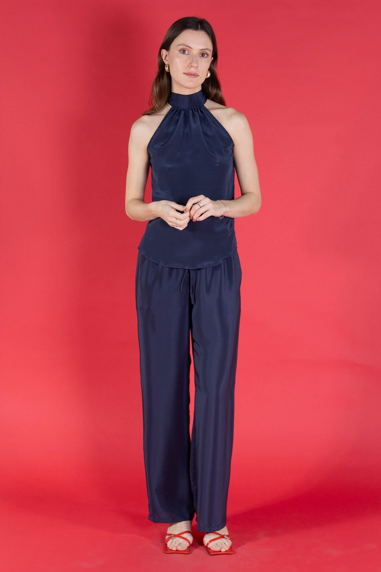 Marina trousers in navy silk crepe de Chine worn with halterneck Olivia top from Pink House Atelier Collections - handmade made to order 