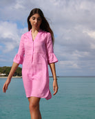 Island holiday style by Lotty B for Pink House, Decima dress in Fuchsia pink on the Cotton House pier, Mustique Island