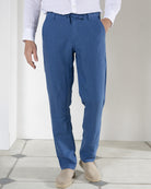 Men's casual blue pure linen pants worn with collarless white shirt by Pink House resortwear