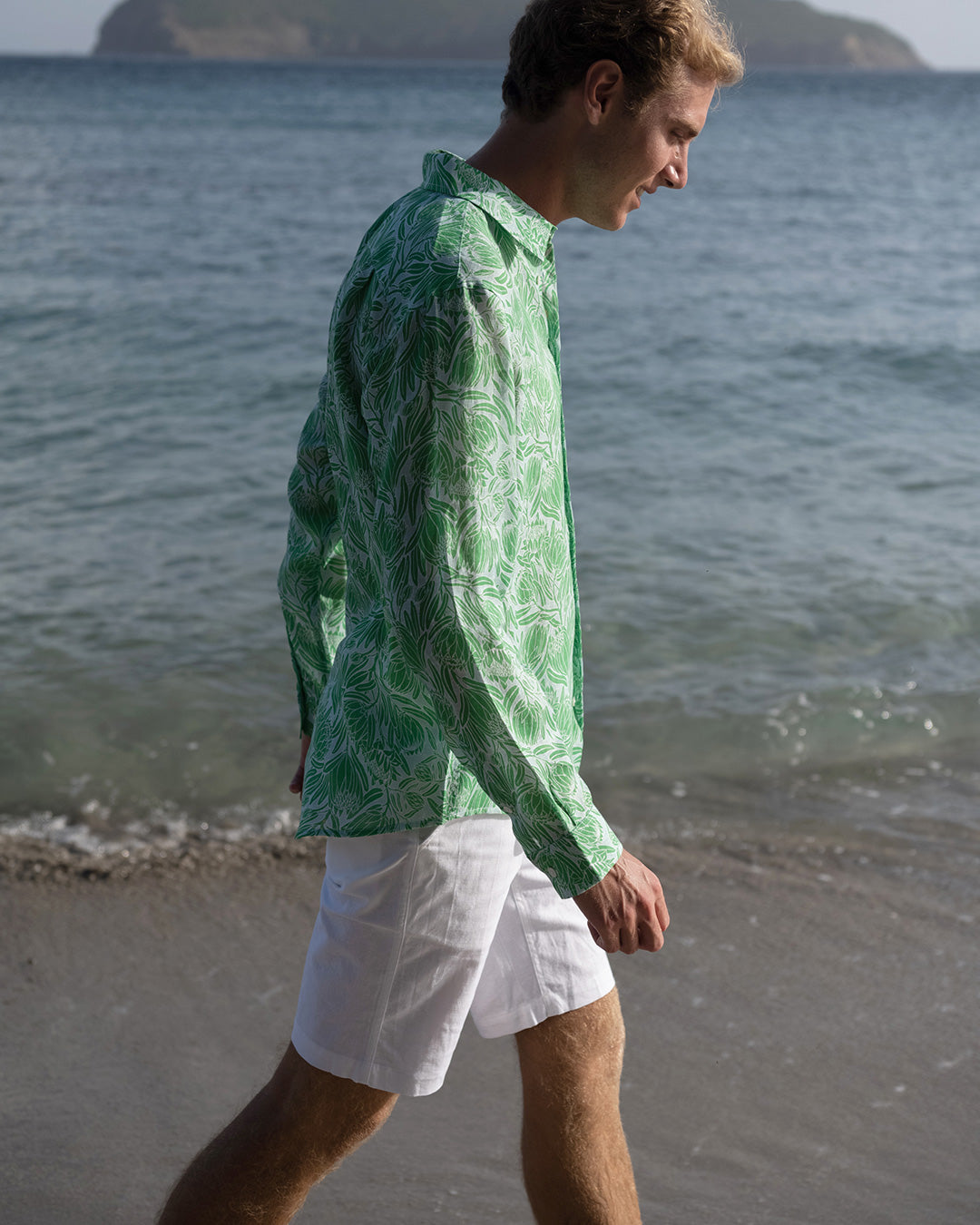 Island vactaion style mens white linen shorts worn with floral protea linen shirt by Pink House, Mustique island