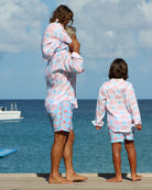 Beach holiday essentials for all the family recycled swim shorts in Potted Palm coral turquoise by Pink House Mustique