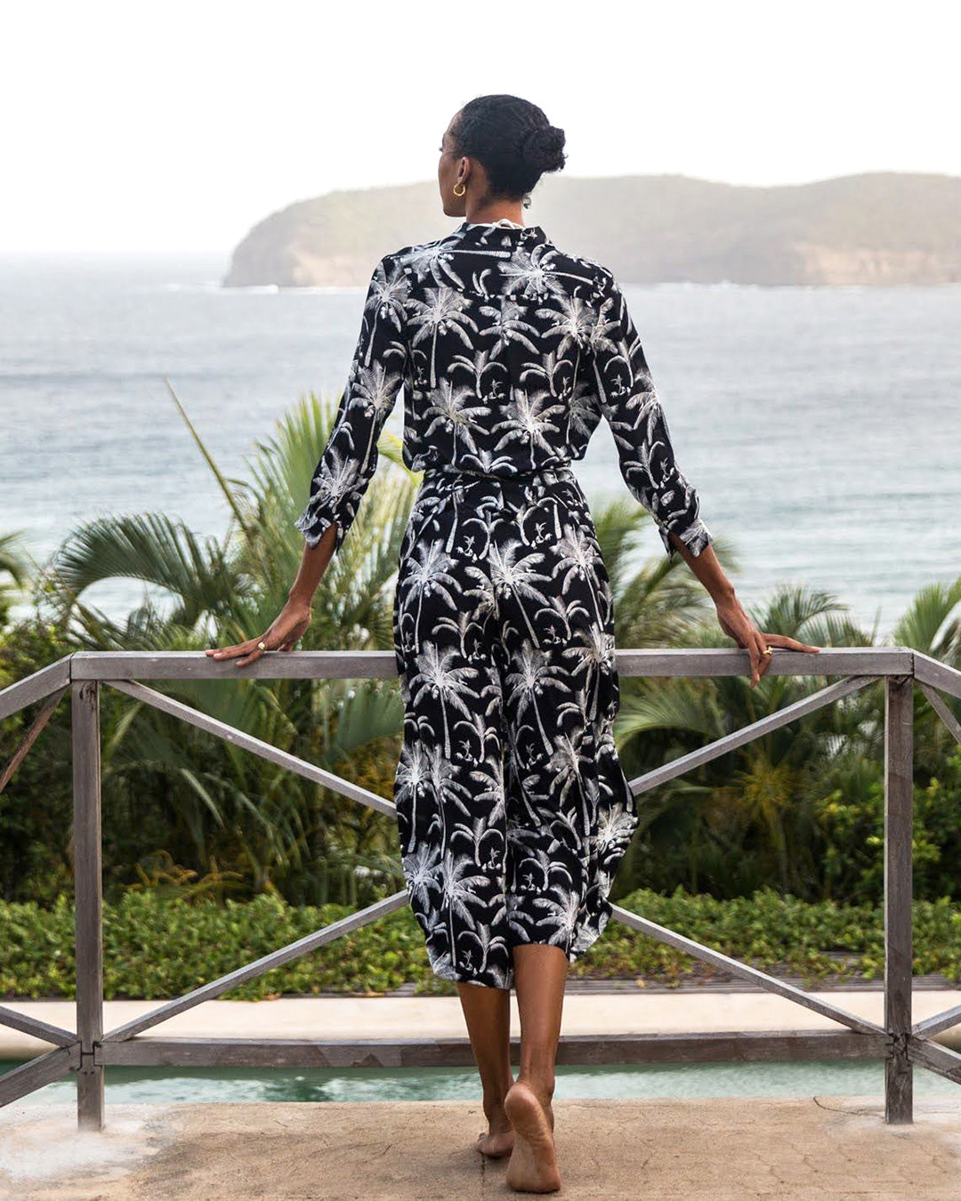 Elegant resort style pure silk blouse in black and white Plantation print paired with matching Gabija palazzo pants by designer Lotty B for Pink House