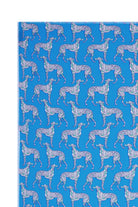 Raw edge detail of silk crepe sarong in Lurcher green & blue print designer Lotty B Mustique