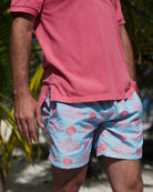 Mens beach chic recycled swim shorts in Potted Palm coral turquoise by Pink House Mustique