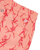 Back pocket detail of men's orange and pink Fruit Punch swim shorts in repreve recycled polyester mix by Lotty B for Pink House