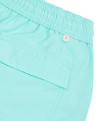 Mens Mako turquoise swim shorts pocket detail by designer Lotty B Mustique for Pink House summer essentials