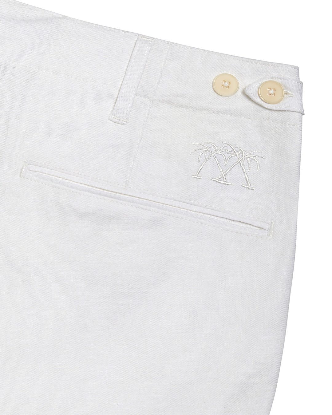 Back pocket, embroidery and natural corozo button details on Mens Linen Shorts in CLASSIC WHITE designer Lotty B for Pink House Mustique