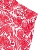 Back pocket detail of mens swim shorts recycled fabric in floral protea red and white print