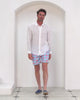 Stylish mens holiday essentials recycled swim shorts in Potted Palm coral turquoise by Pink House Mustique