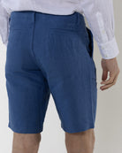 Luxury resortwear for men casual shorts in mid blue with collarless white shirt by Pink House