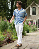 Men's holiday clothing white linen trousers, designer Lotty B Mustique