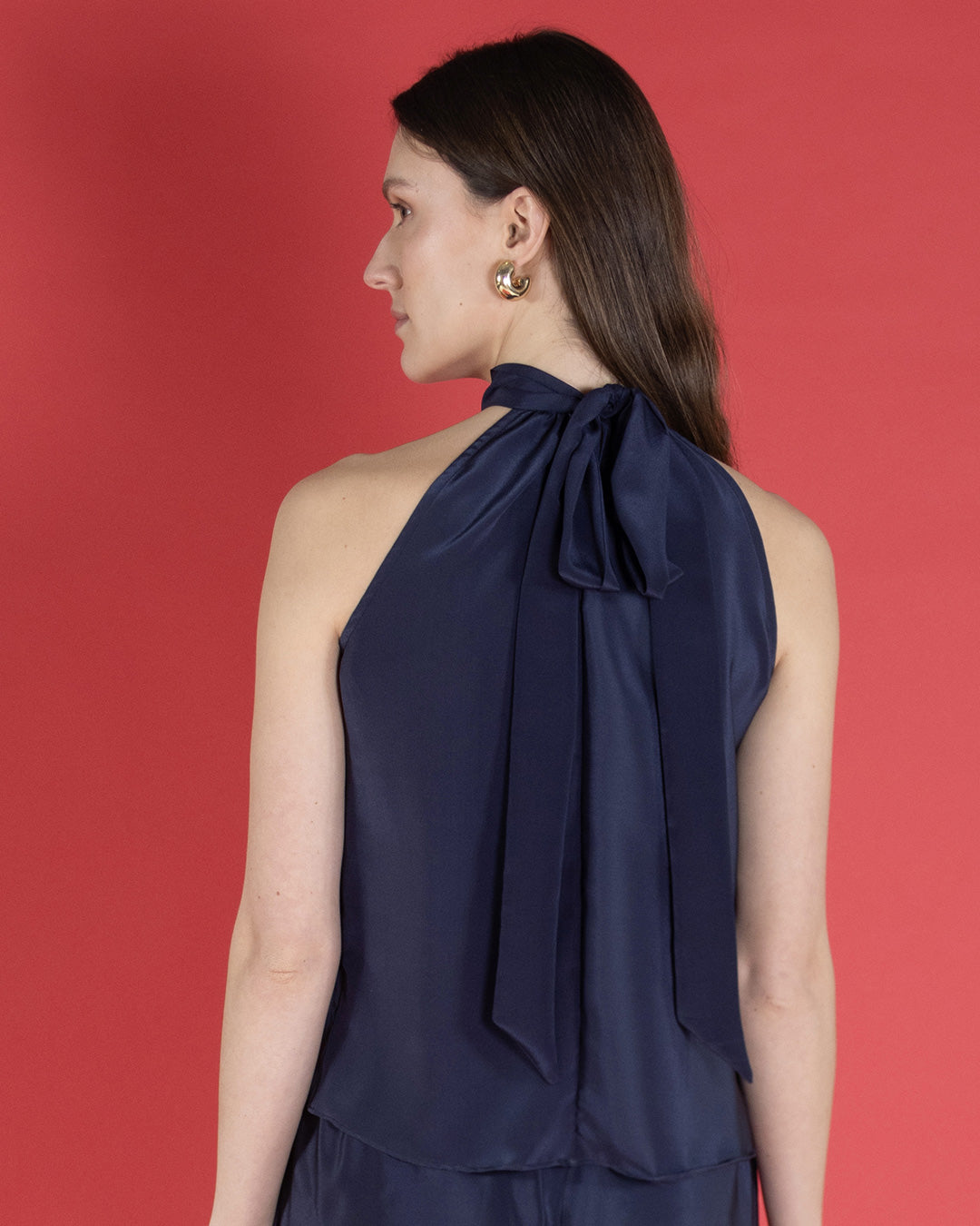 Handmade to order from surplus silk. Women's silk halter top, the Olivia in navy blue crepe de Chine Pink House Atelier collection by designer Lotty B