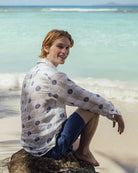 Beach life in a pure linen shirt in green and navy blue Potted Palm print by designer Lotty B for Pink House