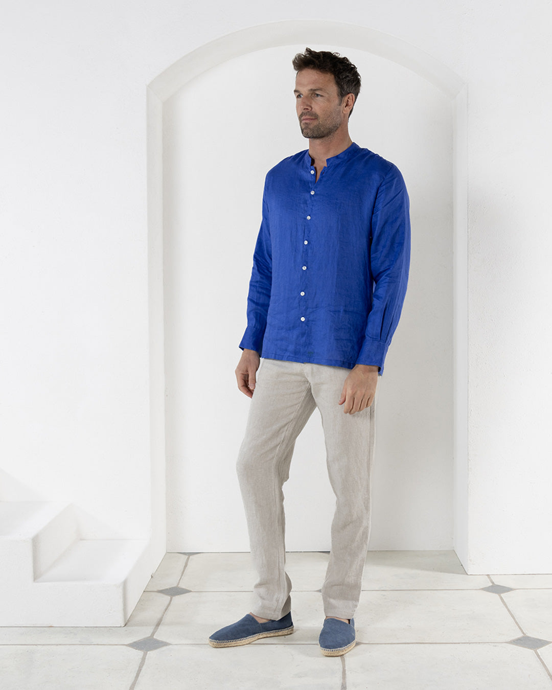 Casual pure linen pants worn with dazzling blue collarless linen shirt by Pink House resortwear