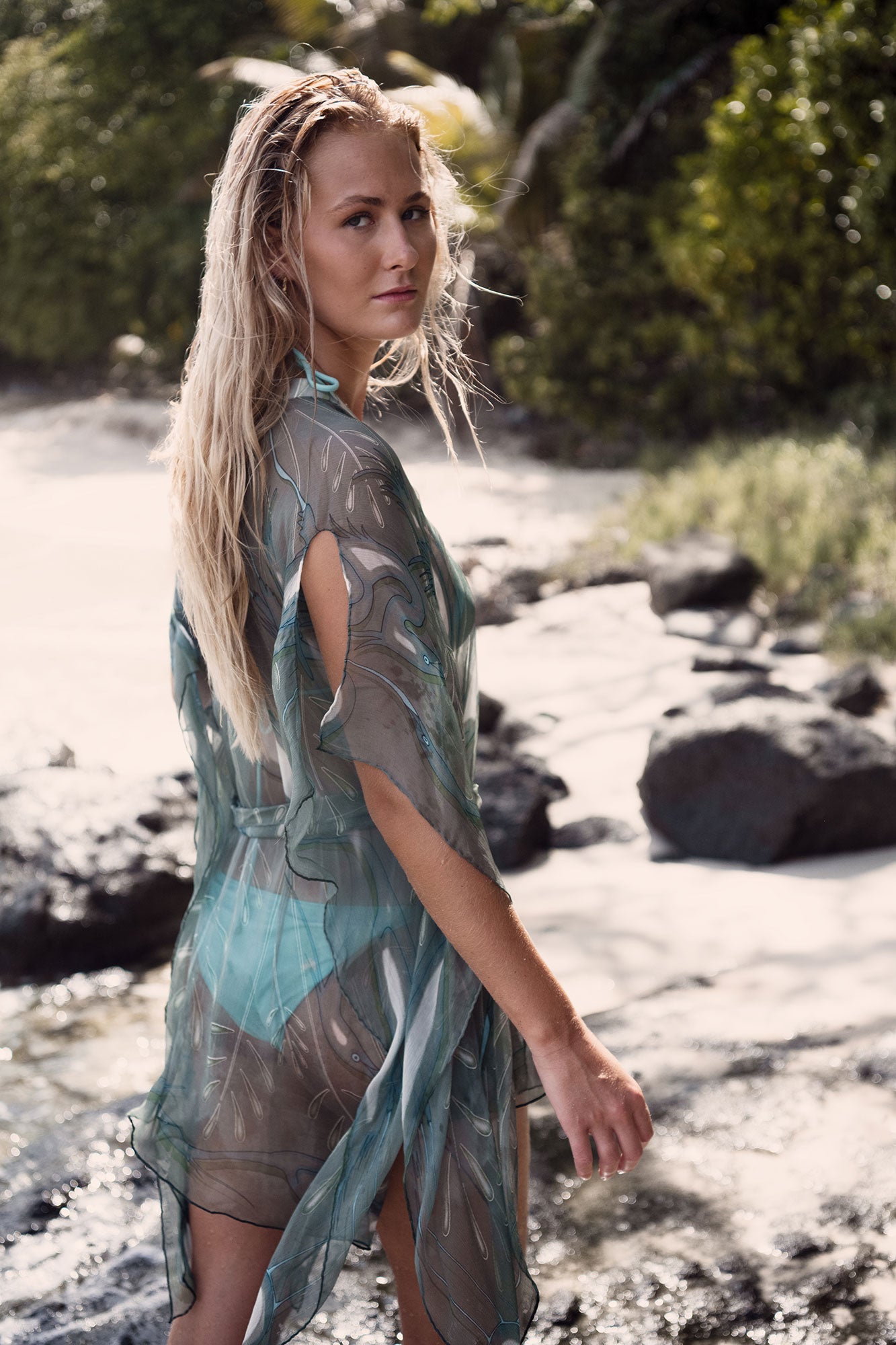 Luxury island beach style, chiffon silk Cosima Kaftan in lichen green Egret design, Cotton House beach, Mustique